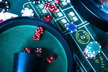 Live dealer casino table with cards and chips